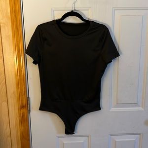 Size L bodysuit, never worn